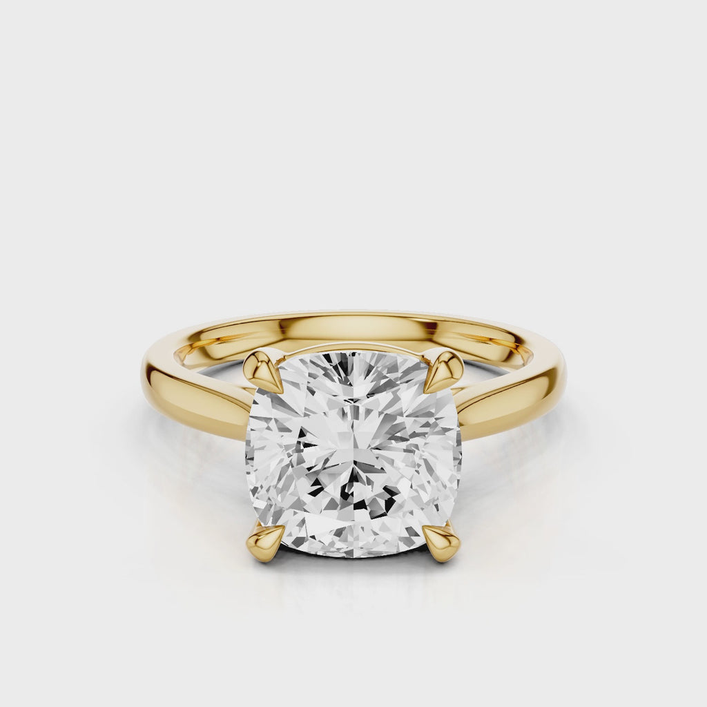 Iris Cushion Lab Created Diamond Engagement Ring set in a cathedral tapered plain white gold band video Yellow Gold