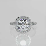 Mimosa Round cut lab diamond engagement ring with a cathedral setting and halo. French pave band video 