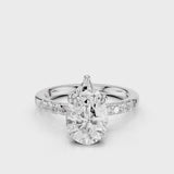 Maida Pear Diamond engagement ring with three accent round side stones on band white gold