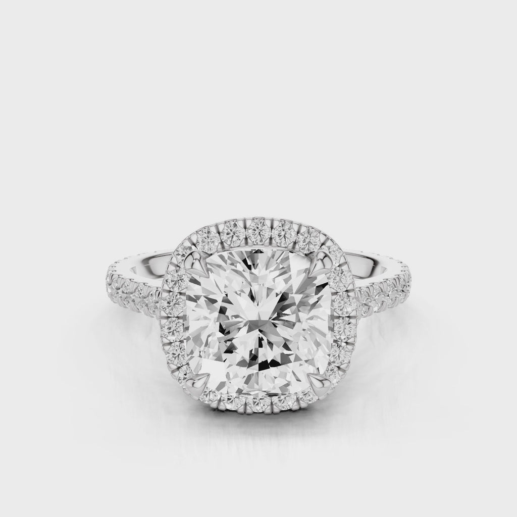 Camellia Cushion Lab Created Diamond Engagement Ring with single seamless halo design. Cathedral with single row diamond French pave band video  White Gold