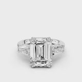 Esti Emerald Engagement Ring with tapered baguettes and cathedral setting and double tiger prongs white gold