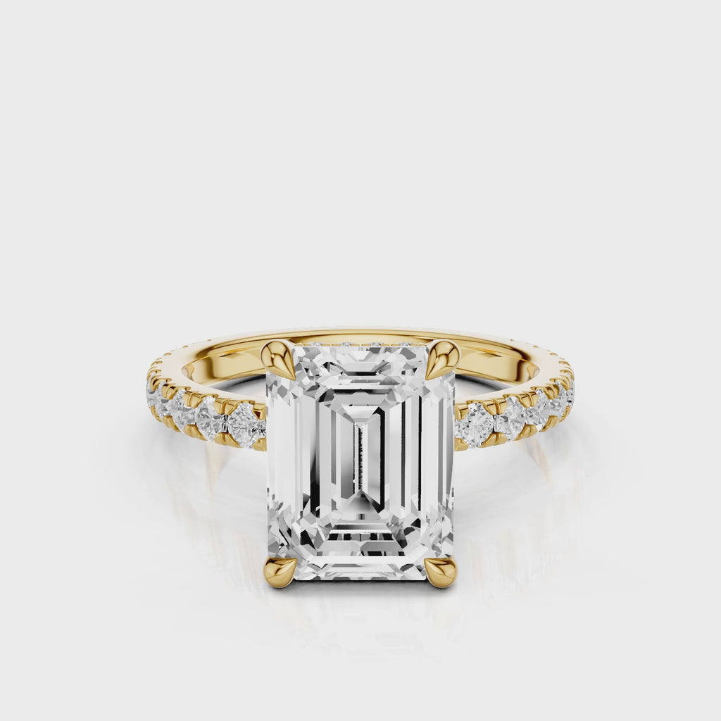 Mira Emerald lab diamond engagement ring. Non-cathedral shank, single row french pave setting band with a 4 prongs setting video Yellow Gold