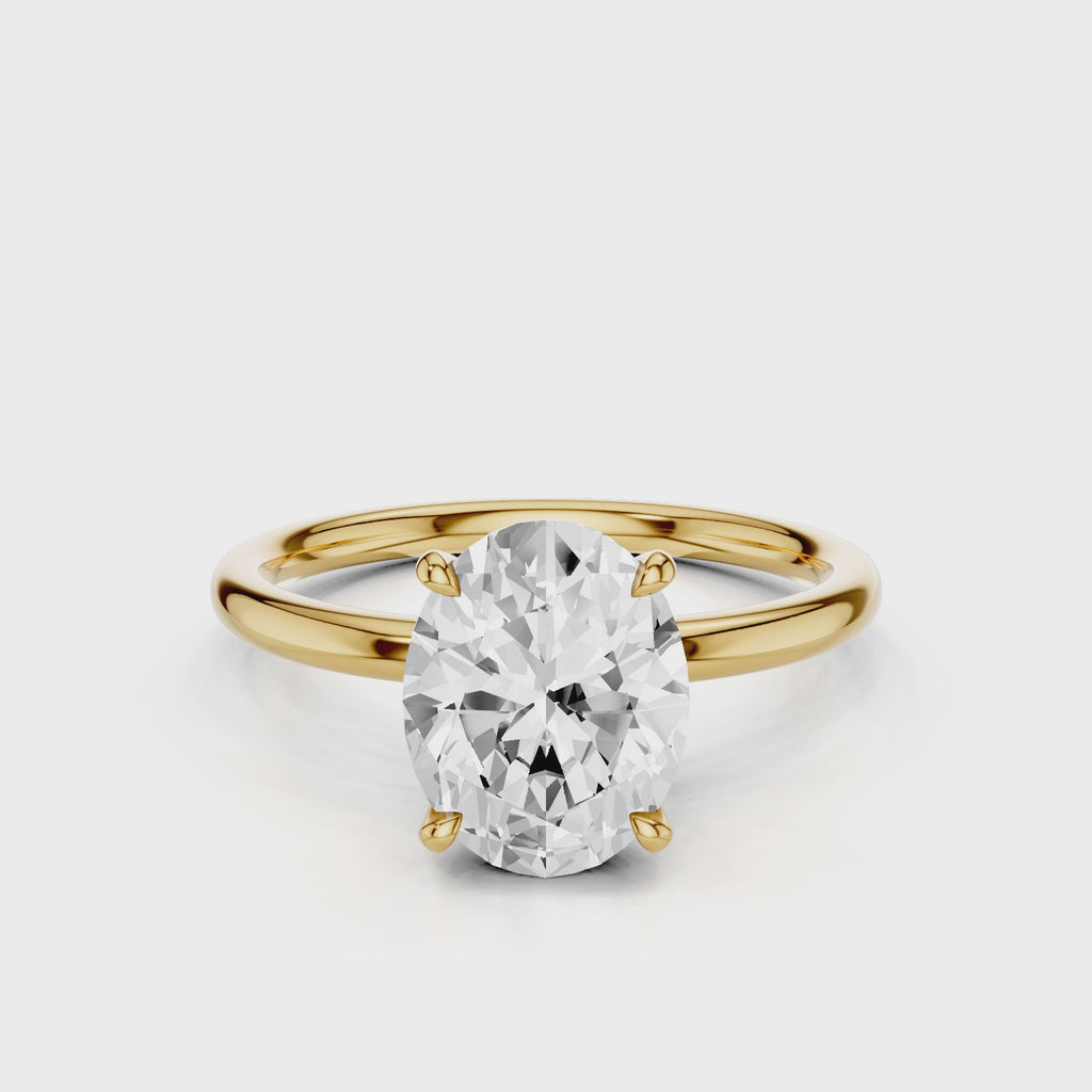 Bella Oval lab diamond engagement ring solitaire with four prongs Yellow Gold