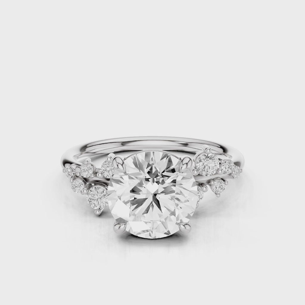 Vega Round cut lab diamond engagement ring with four prongs and Round accent diamonds video White Gold