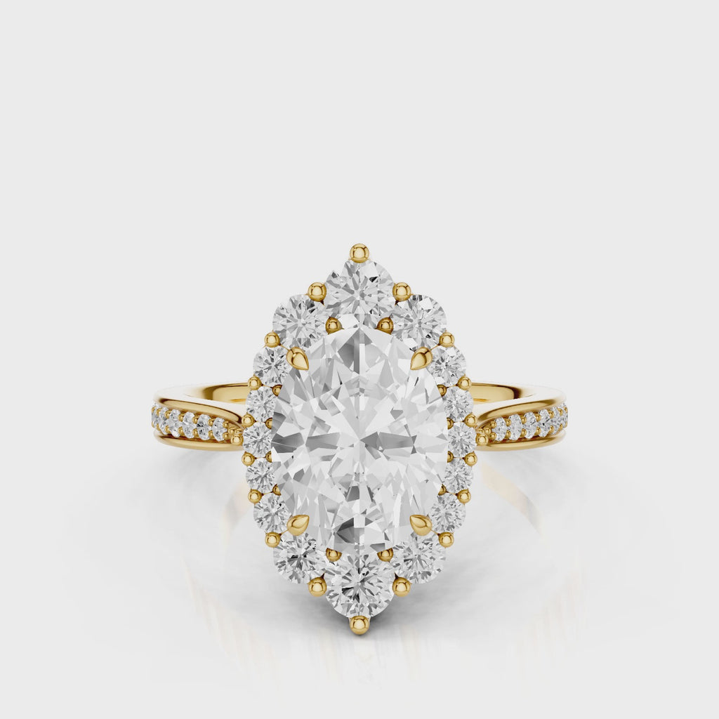 Antoinette Oval lab diamond engagement ring. Cathedral shank, seamless halo, side accents, diamond bead setting. Yellow Gold