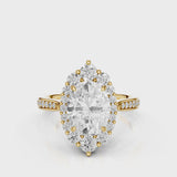 Antoinette Oval lab diamond engagement ring. Cathedral shank, seamless halo, side accents, diamond bead setting. Yellow Gold